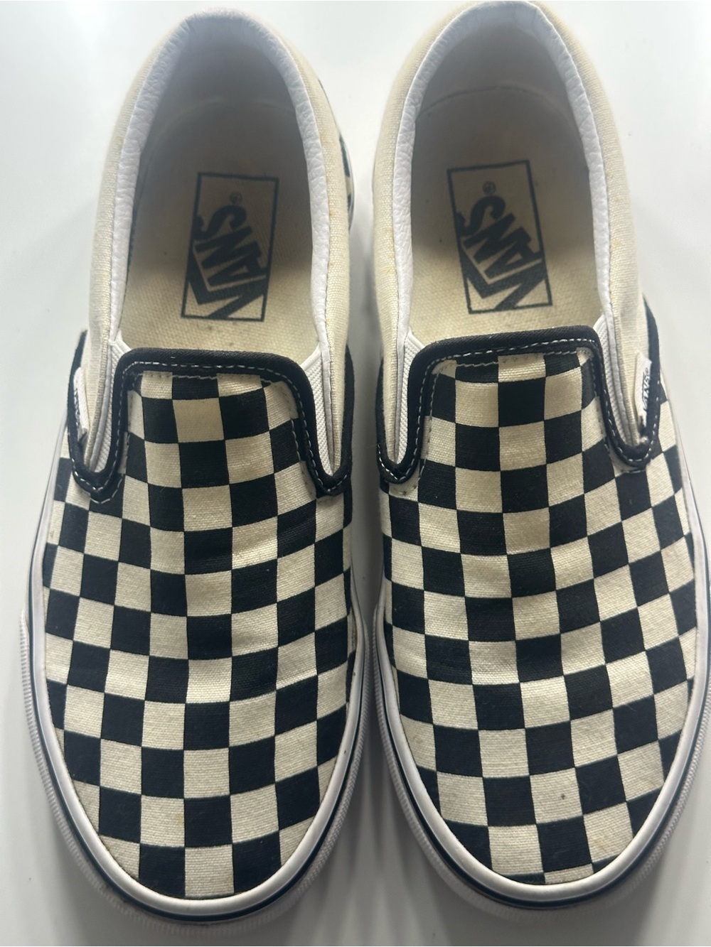 Vans Black & White Checkerboard Slip-On Sneakers